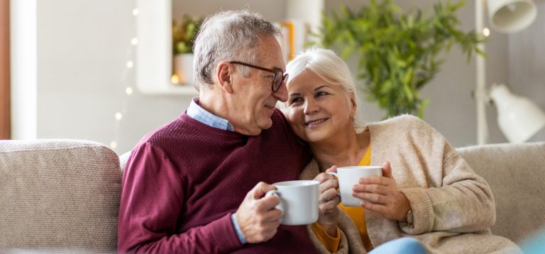 Portrait,Of,A,Happy,Elderly,Couple,Relaxing,Together,On,The